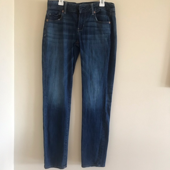 dark blue jeans with rips